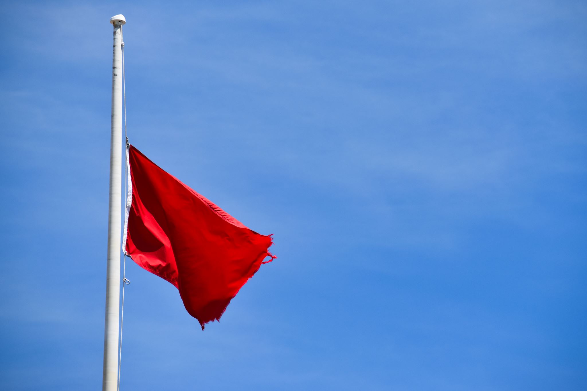 Single Red Beach Flag