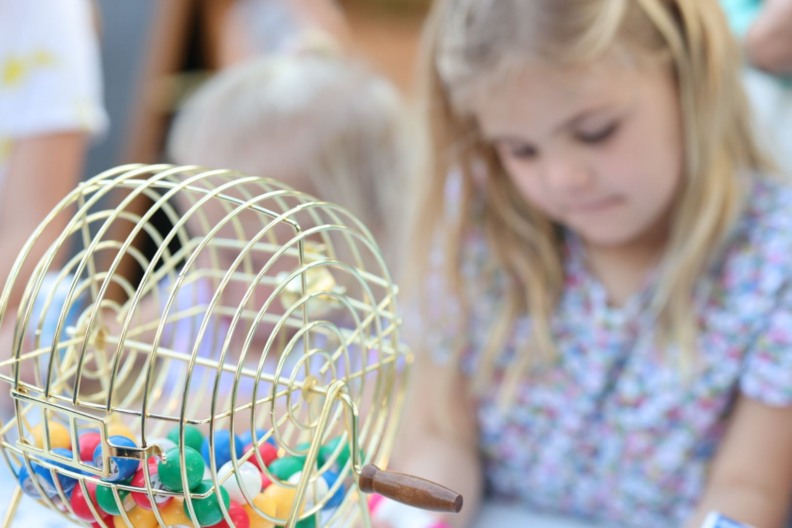 Girl playing bingo in Marina Park